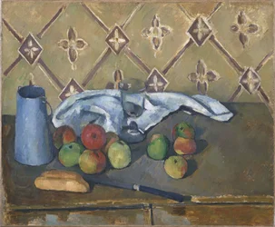 Jarra de frutas, guardanapo e leite
