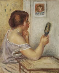 Marie Dupuis segurando um espelho com um retrato de Coco
