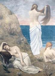 Moças jovens à beira-mar