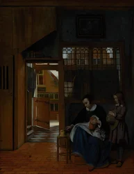 Uma mulher preparando pão e manteiga para um menino, c.1660-3