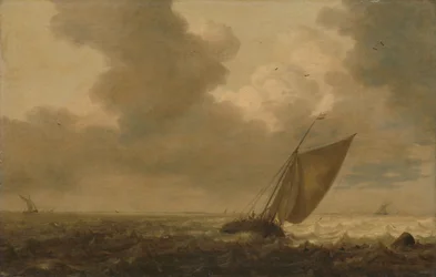 Um barco de carga a navegar antes do vento