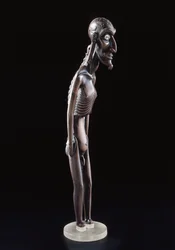 Figura de madeira esculpida na forma de um homem, da Ilha de Páscoa, antes de 1894 (madeira e obsidiana)
