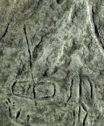 Pré-história, arte rupestre: petroglifo (grafite sobre pedra) de uma representação de um barco e de uma figura humana. neolítico, idade da pedra. (Azerbaijão) Idade do Bronze. Baku, Museu de História da Religião do Estado do Azerbaijão