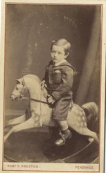 Menino jovem, sentando, ligado, um, cavalo balanço, 1870s, (albumen, impressão)