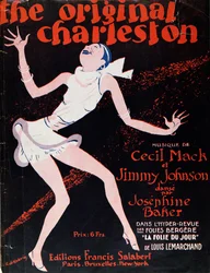 Josephine Baker (1906-75) a dançar o Charleston, cartaz publicitário de um espectáculo no Folies Bergere