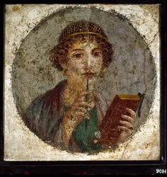 Retrato assumido de Sapho (ou sapo) poetisa grega. Mulher romana com livro e caneta (stylus ou estilo), de Pompéia, Nápoles, Itália