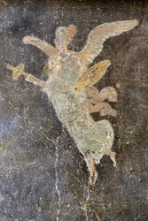 Fresco com figura alada, ala direita na Casa de Vettii, Pompeia (Património Mundial da UNESCO
