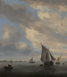 Vista de um lago com navios à vela
