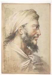 Cabeça de um homem barbudo de perfil à direita usando um turbante