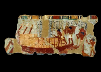 Arte Egípcia Antiga: carregamento de grãos em uma pintura de barco em lodo do túmulo de Ounou (1450 a.C.).