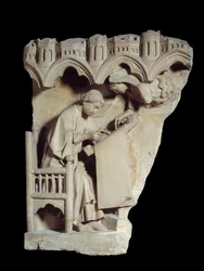 O evangelista Saint Mathieu (Mateus), que é um escritor sob o ditado do anjo Alívio do calcário do cubo da catedrais de Chartres. Paris, Museu do Louvre