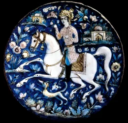 Arte Iraniana: prato de cerâmica policromada representando um cavaleiro. Colecção privada do século XVI