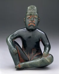 Figura sentada com joelho levantado, Highland Olmec, San Martin Texmelucan