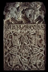 Arte persa: painel de estuque decora arabescos e dois cavaleiros lutando. Seattle. Museu de Arte
