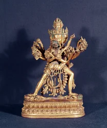 Hevajra e Nairatmya (bronze dourado com incrustação de prata)