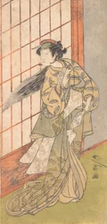 O primeiro Nakamura Tomijuro como uma mulher irritada em pé em uma sala, 1772 ou 1773.
