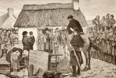 Inquilinos pobres expulsos de casa durante a crise da Irish National Land League, de «La Ilustración Española y Americana» de 1881