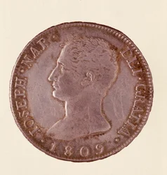 Moeda de prata (douro ou piastra) de Espanha: reinado de José Napoleão (1808-1813). 1809 Diam. 4 cm Nápoles, museo archeologico