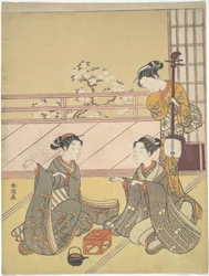 Jovens mulheres a jogar kitsune-ken (jogo da raposa)