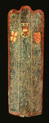 Um raro pavimento suíço de madeira coberto com tela pintada de gesso com desenho de folhagem verde e os escudos de armas dos Habsburgos, da Liga de São Jorge e da cidade de Winterthur, c.1445