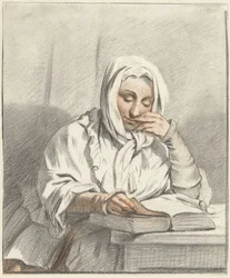 Leitura de uma jovem mulher a uma mesa