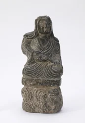 Pequena estátua de um padre budista