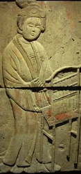 Estela representando um músico (terracotta)