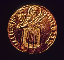 Florim de ouro, a moeda florentina tão apreciada no comércio renascentista.