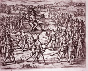 O rei inca Atahualpa (ou Atabaliba), segurando um ceptro em forma de sol, é transportado numa liteira para se encontrar com Francisco Pizarro