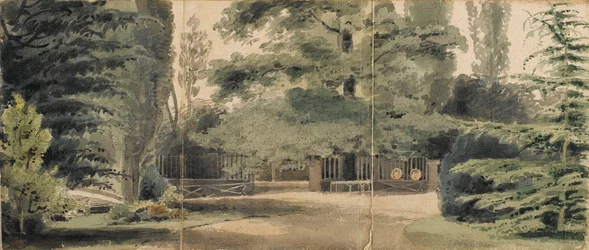 Caminhos e uma vedação por baixo de árvores nos terrenos de Merton