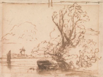 Um barco amarrado junto à margem de um rio