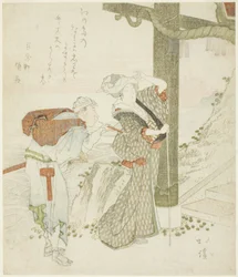 Mulher e atendente no portão de entrada de Enoshima