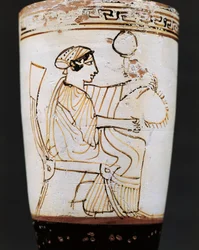 Lekythos, frasco de óleo atribuído a Tymbos Pintor que representa mulher tecedora de coroa, século V a.C.