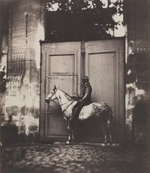 Cavaleiro negro diante de uma porta, c. 1855.
