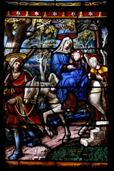 A igreja de Saint-Remy de Troyes. Janela de vidro manchado: Cenas da vida da Virgem. Detalhe : O Voo para o Egipto. Oficina Vincent-Larcher, século XIX