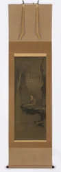 Guanyin, vestido de branco, sentado sobre uma rocha suspensa, período Muromachi, século XV.