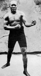 Jack Johnson, o primeiro campeão mundial negro de boxe de pesos pesados, 1908, 1951