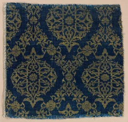 Lampas com medalhões foliados em treliça ogival, 1400s.