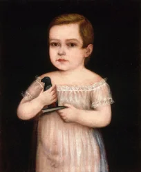 Criança com papagaio de brinquedo