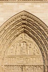 Ala oeste da catedral de Paris Notre Dame: Portão de Santa Ana, Paris, França