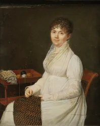 Retrato de uma mulher com trabalho de tapeçaria.