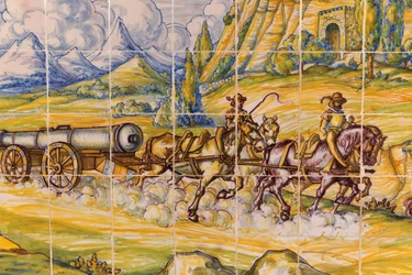 Segóvia, Província de Segóvia, Espanha. Pintura moderna em cerâmica de peça de artilharia do século XVI a ser desenhada por cavalos. (foto)