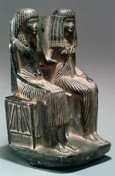 Estátua de um oficial egípcio antigo e sua esposa, séculos XII-XII aC
