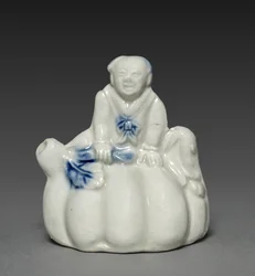 Waterdropper em forma de menino chinês sentado em uma cabaça, do século XVIII a XIX.