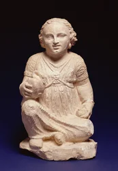 Uma menina sentada com um cisne, cipriota, c.200 a.C. (calcário e pigmento)