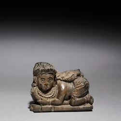 Estatueta de uma mulher agachada, 900-800 aC