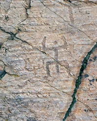 Figuras humanas, gravuras rupestres no Parque Nacional de Arte Rupestre de Naquane (Lista do Património Mundial da UNESCO)