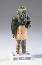 Gênio mitológico das montanhas, c.2200 aC (calcário e clorita, diadema feito de ferro meteórico)