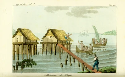 Casas Stilt no oceano na ilha de Rawak, Papua Nova Guiné