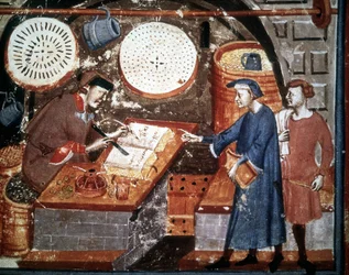 Loja de artesanato no século XIV. Manuscrito em miniatura do século XIV. Biblioteca Medicea Laurenziana, Florença.